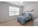 Bedroom featuring a comfy bed, window, and neutral carpet at 628 Dorado Rd, Wendell, NC 27591