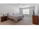 Spacious bedroom featuring a ceiling fan, window, and neutral carpet at 628 Dorado Rd, Wendell, NC 27591