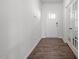 Bright entryway with hardwood floors, leading to French doors and a welcoming space at 628 Dorado Rd, Wendell, NC 27591