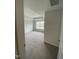 Inviting bedroom with plush carpet, a trey ceiling, and large window offering natural light at 9212 Leaning Post Rd # 448, Wake Forest, NC 27587