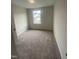 Cozy bedroom featuring neutral carpet, one window providing great natural lighting at 9212 Leaning Post Rd # 448, Wake Forest, NC 27587