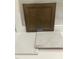 Showcases a wood cabinet door and Majestic Blanco Maple Quartz surface samples at 9212 Leaning Post Rd # 448, Wake Forest, NC 27587