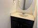 Bathroom vanity with modern sink and mirror, offering a clean and contemporary look at 140 Token House Rd, Durham, NC 27703