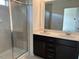 Bathroom with double sink vanity and tile shower with glass door at 140 Token House Rd, Durham, NC 27703