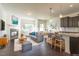 Bright living room featuring a modern fireplace and an open floorplan concept with stylish kitchen at 140 Token House Rd, Durham, NC 27703