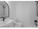 Modern bathroom features a vanity, toilet, and tub/shower at 215 E Cabarrus St, Raleigh, NC 27601