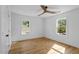 This is a bright bedroom with hardwood floors and lots of natural light at 215 E Cabarrus St, Raleigh, NC 27601