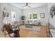 Inviting living room with ample seating, natural light, and hardwood floors at 215 E Cabarrus St, Raleigh, NC 27601