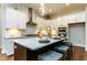 Modern kitchen with stainless steel appliances, granite countertops, and a spacious island at 274 Golden Leaf Farms Rd, Angier, NC 27501
