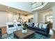Bright and airy living room with open floor plan and views of the kitchen and dining area at 274 Golden Leaf Farms Rd, Angier, NC 27501