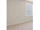 Bright bedroom features neutral carpet, and a window offering natural light at 236 Moore Creek Dr, Fuquay Varina, NC 27526