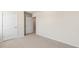 Neutral bedroom with carpet, white walls, and closet at 236 Moore Creek Dr, Fuquay Varina, NC 27526