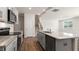 Updated kitchen features granite counters, stainless appliances and eat-in dining at 236 Moore Creek Dr, Fuquay Varina, NC 27526