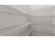 Spacious pantry with white wire shelving system for organized storage at 236 Moore Creek Dr, Fuquay Varina, NC 27526