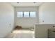 Modern bathroom with white tile, and natural light at 280 Forest Bridge Rd, Franklinton, NC 27525