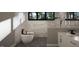 Stylish bathroom features a modern tub, sleek marble walls, and dual vanity sinks at 280 Forest Bridge Rd, Franklinton, NC 27525