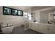 This bathroom has a standalone tub, white marble wall, and black fixtures at 280 Forest Bridge Rd, Franklinton, NC 27525