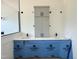 Bathroom featuring double vanities, modern cabinetry, and fixtures with a separate shower at 280 Forest Bridge Rd, Franklinton, NC 27525