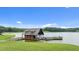 Charming boathouse on the lake with docking and lakeside lounging at 280 Forest Bridge Rd, Franklinton, NC 27525