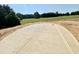 Newly built concrete driveway offers a durable and visually appealing entrance to the property at 280 Forest Bridge Rd, Franklinton, NC 27525