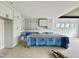 Bright kitchen with white cabinetry, modern hardware, and center island at 280 Forest Bridge Rd, Franklinton, NC 27525