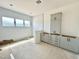 Bright kitchen with white tile backspace and modern cabinets and drawers at 280 Forest Bridge Rd, Franklinton, NC 27525