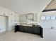 Spacious kitchen featuring modern cabinets, a central island, and a well-lit area at 280 Forest Bridge Rd, Franklinton, NC 27525