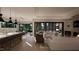 Open-concept living area connecting the kitchen, dining space, and lounge with stylish decor and ample natural light at 280 Forest Bridge Rd, Franklinton, NC 27525