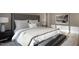 Comfortable main bedroom featuring a padded headboard, side tables, artwork and ample natural light at 280 Forest Bridge Rd, Franklinton, NC 27525