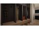 Functional mudroom with built-in storage, wooden bench, and coat hooks at 280 Forest Bridge Rd, Franklinton, NC 27525