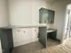 Home office space features built-in cabinetry, a sleek gray desktop, and ample room for productivity at 280 Forest Bridge Rd, Franklinton, NC 27525