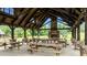 Spacious outdoor pavilion with vaulted wood ceilings and ample seating near the waterfront at 280 Forest Bridge Rd, Franklinton, NC 27525
