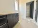 This room features new cabinets, fixtures, and a doorway to a walk-in closet at 280 Forest Bridge Rd, Franklinton, NC 27525