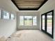 Sun-filled room with wooden inset ceiling and access to the outdoors at 280 Forest Bridge Rd, Franklinton, NC 27525