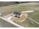 Aerial view of a single-Gathering home with a spacious driveway at 233 Surles Rd, Benson, NC 27504
