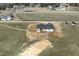 Aerial view of a single-Gathering home with a spacious backyard at 233 Surles Rd, Benson, NC 27504