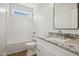 Bathroom featuring a tub with shower, toilet, and sink with granite countertop at 233 Surles Rd, Benson, NC 27504
