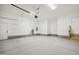 Clean, well-lit garage with a door and space for parking vehicles and storage at 233 Surles Rd, Benson, NC 27504
