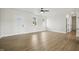 Bright living room featuring hardwood floors, white walls, and modern fixtures at 233 Surles Rd, Benson, NC 27504