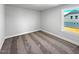 Bedroom with neutral walls and carpet with a view from the window at 33 Macy Cir, Wendell, NC 27591