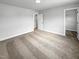 Spacious bedroom with neutral carpet and ample natural light at 33 Macy Cir, Wendell, NC 27591