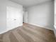 Bedroom with carpet, closet and neutral paint at 33 Macy Cir, Wendell, NC 27591