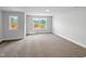 Bedroom with carpet, neutral walls and a view from the windows at 33 Macy Cir, Wendell, NC 27591