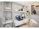 Bright home office featuring a white desk with shelving, perfect for a productive workspace at 33 Macy Cir, Wendell, NC 27591