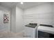 Laundry room featuring new front load washer and dryer at 33 Macy Cir, Wendell, NC 27591