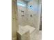 Modern marble shower with built-in bench and niche at 33 Macy Cir, Wendell, NC 27591