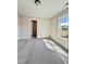 Bedroom featuring neutral paint, carpet, and window looking out to the yard at 40 Sunrise Ct, Spring Hope, NC 27882