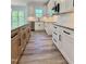 Kitchen with granite counters, stainless appliances, and wood-look floors at 40 Sunrise Ct, Spring Hope, NC 27882