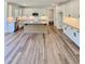 Spacious kitchen with white cabinets, granite countertops, stainless appliances, and walk-in pantry at 40 Sunrise Ct, Spring Hope, NC 27882