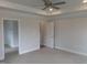 Bedroom with neutral carpeting and a tray ceiling at 73 High Hampton Way, Fuquay Varina, NC 27526